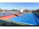 Bright and active pickleball court with players enjoying a game under a clear blue sky at 18805 E Loredo Ln, Rio Verde, AZ 85263