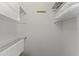 Bright and spacious closet with shelving and rod at 19821 N Springfield Dr, Sun City, AZ 85373