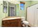 Clean bathroom with shower/tub combo and wood vanity at 20089 N 263Rd Dr, Buckeye, AZ 85396