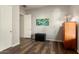 Spacious bedroom with wood-look floors and built in storage at 20089 N 263Rd Dr, Buckeye, AZ 85396