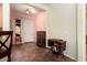 Bright entryway with tile flooring and vintage furniture at 20089 N 263Rd Dr, Buckeye, AZ 85396
