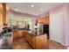 Modern kitchen with granite countertops and stainless steel appliances at 20089 N 263Rd Dr, Buckeye, AZ 85396