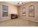 Bedroom featuring carpet flooring, a ceiling fan, and wood framed windows at 20369 N 272Nd Ave, Buckeye, AZ 85396