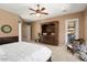 Primary bedroom featuring neutral colors, carpet flooring, and a ceiling fan at 20369 N 272Nd Ave, Buckeye, AZ 85396