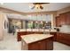 Spacious kitchen featuring granite countertops, stainless steel appliances, and an island at 20369 N 272Nd Ave, Buckeye, AZ 85396