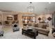 Open concept living room with views into the kitchen and dining area at 20369 N 272Nd Ave, Buckeye, AZ 85396