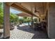 Large patio with ceiling fans, several seating areas, and pool views at 20369 N 272Nd Ave, Buckeye, AZ 85396