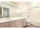 Bathroom with double sinks and shower/tub at 20435 N 39Th Dr, Glendale, AZ 85308