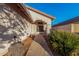Pathway to the front entrance with landscaping and exterior lighting at 20435 N 39Th Dr, Glendale, AZ 85308