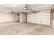 Attached garage with automatic door opener and extra storage space at 20435 N 39Th Dr, Glendale, AZ 85308