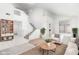 Bright and airy living room with high ceilings, staircase, and ample natural light at 20435 N 39Th Dr, Glendale, AZ 85308