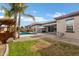 Backyard oasis with pool, patio, and pergola at 22174 E Creekside Dr, Queen Creek, AZ 85142