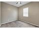 Bright bedroom featuring carpet and window blinds at 22174 E Creekside Dr, Queen Creek, AZ 85142