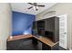 Home office with built-in desk and storage, perfect for working from home at 22174 E Creekside Dr, Queen Creek, AZ 85142