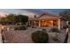 Relaxing backyard oasis with covered patio and fire pit at 23187 W Lasso Ln, Buckeye, AZ 85326
