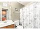 Clean bathroom with shower/tub combo and updated vanity at 23187 W Lasso Ln, Buckeye, AZ 85326