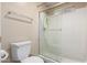 Bathroom with toilet and large walk-in shower at 23187 W Lasso Ln, Buckeye, AZ 85326