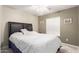 Bright bedroom with a comfortable bed and large closet at 23187 W Lasso Ln, Buckeye, AZ 85326
