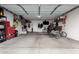 Two-car garage with extra storage and shelving at 23187 W Lasso Ln, Buckeye, AZ 85326