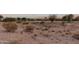 View of a golf course from a desert landscape at 23187 W Lasso Ln, Buckeye, AZ 85326