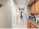 Home hallway with access to bathroom and other rooms at 23187 W Lasso Ln, Buckeye, AZ 85326