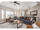 Bright living room with comfy seating and large window at 2617 E Dartmouth St, Mesa, AZ 85213