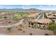 Aerial view of a residential area adjacent to a golf course at 26702 W Sierra Pinta Dr, Buckeye, AZ 85396