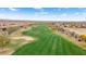 Aerial view of a golf course and residential neighborhood at 26702 W Sierra Pinta Dr, Buckeye, AZ 85396