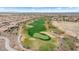 Aerial view of a golf course and surrounding neighborhood at 26702 W Sierra Pinta Dr, Buckeye, AZ 85396