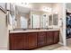 Double vanity bathroom with granite countertop and ample storage at 26702 W Sierra Pinta Dr, Buckeye, AZ 85396