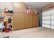 Garage with ample storage cabinets and shelving at 26702 W Sierra Pinta Dr, Buckeye, AZ 85396