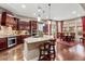 Large kitchen with an island, stainless steel appliances, and a breakfast nook at 26702 W Sierra Pinta Dr, Buckeye, AZ 85396