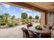 Outdoor patio with seating area and golf course view at 26702 W Sierra Pinta Dr, Buckeye, AZ 85396