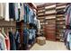 Large walk-in closet with custom shelving and ample hanging space at 26702 W Sierra Pinta Dr, Buckeye, AZ 85396