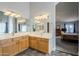 Large bathroom with double vanity and walk-in shower at 3121 E Hackamore St, Mesa, AZ 85213