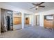 Large bedroom with mirrored closet and dresser at 3121 E Hackamore St, Mesa, AZ 85213