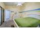 Bedroom with double bed, dresser, and mirrored closet at 3121 E Hackamore St, Mesa, AZ 85213