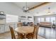 Bright dining area with wood table and chairs at 3121 E Hackamore St, Mesa, AZ 85213