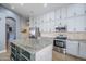 Updated kitchen with stainless steel appliances and granite countertop at 3121 E Hackamore St, Mesa, AZ 85213