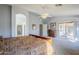 Main bedroom with large windows, patio access and ensuite bathroom at 3121 E Hackamore St, Mesa, AZ 85213