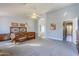 Main bedroom with ensuite bathroom and access to backyard at 3121 E Hackamore St, Mesa, AZ 85213