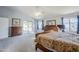 Main bedroom with backyard access and ample closet space at 3121 E Hackamore St, Mesa, AZ 85213
