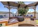 Entertaining outdoor kitchen under a pergola at 3121 E Hackamore St, Mesa, AZ 85213
