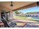 Spacious patio with seating area and backyard view at 3121 E Hackamore St, Mesa, AZ 85213