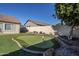 Landscaped backyard putting green at 3121 E Hackamore St, Mesa, AZ 85213