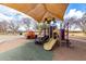 Community playground with shaded play area and climbing toys at 34696 N Barzona Trl, San Tan Valley, AZ 85143