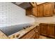 Kitchen detail showing granite countertop and gas cooktop at 43512 N 16Th St, New River, AZ 85087