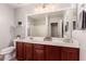 Neutral bathroom with vanity, drawers, counter space, large mirror, and shower-tub combo at 6512 W Eagle Talon Trl, Phoenix, AZ 85083