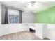 Charming bedroom with light green accent wall at 6512 W Eagle Talon Trl, Phoenix, AZ 85083
