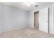 Simple bedroom with light gray walls and carpet at 6512 W Eagle Talon Trl, Phoenix, AZ 85083